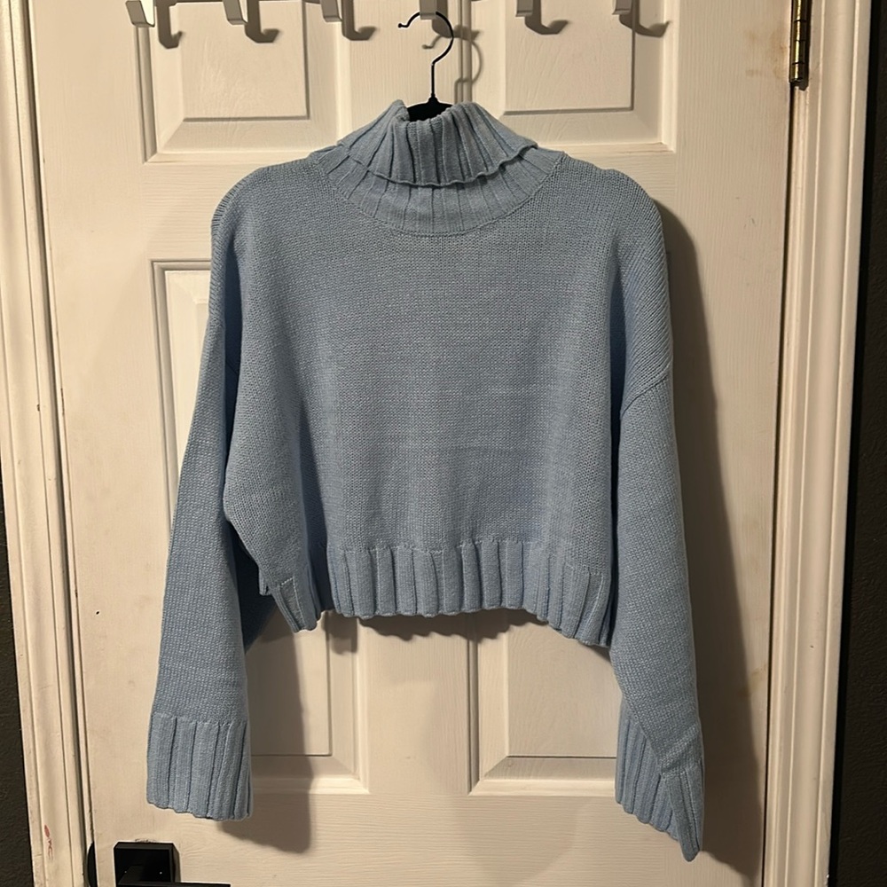 NEW. Light blue cropped turtle neck sweater
